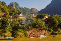 Nong Khiaw village nestled on hillside by river