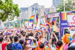 Is Taiwan LGBT Friendly? Overhead shot of Pride march featuring many rainbow flags in Taiwan