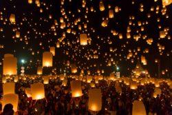 Pingxi Sky Lantern Festival showing hundreds of lanterns floating in sky at night time